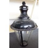 A Victorian style ebonised copper street lantern terminal of circular tapering form,