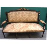 A 19th century parcel gilt ebonised open arm sofa, with flaming torch and quiver carved crest,