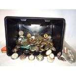 A box of assorted metal pocket watch cases,