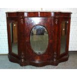 A Victorian walnut serpentine credenza with mirrored panel doors and white marble top,