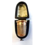 A 9ct gold thimble, the plain band engraved with initials, by Charles Horner, Chester 1905,