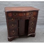 A Queen Anne style mahogany kneehole writing desk, 19th century,
