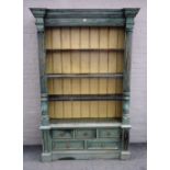 A 20th century oxide green painted bookcase cupboard,