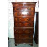 A 20th century mahogany chest on chest with two short over six long drawers on bracket feet,