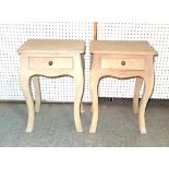 A pair of 20th century pine single drawer bedside tables on cabriole supports,