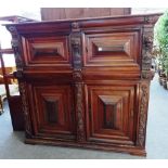 A 17th century and later Indo-Dutch rosewood side cabinet with two pairs of raised panelled doors