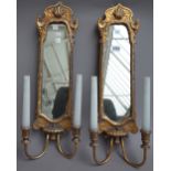 A pair of George I style gilt twin branch girandole mirrors, 57cm high,