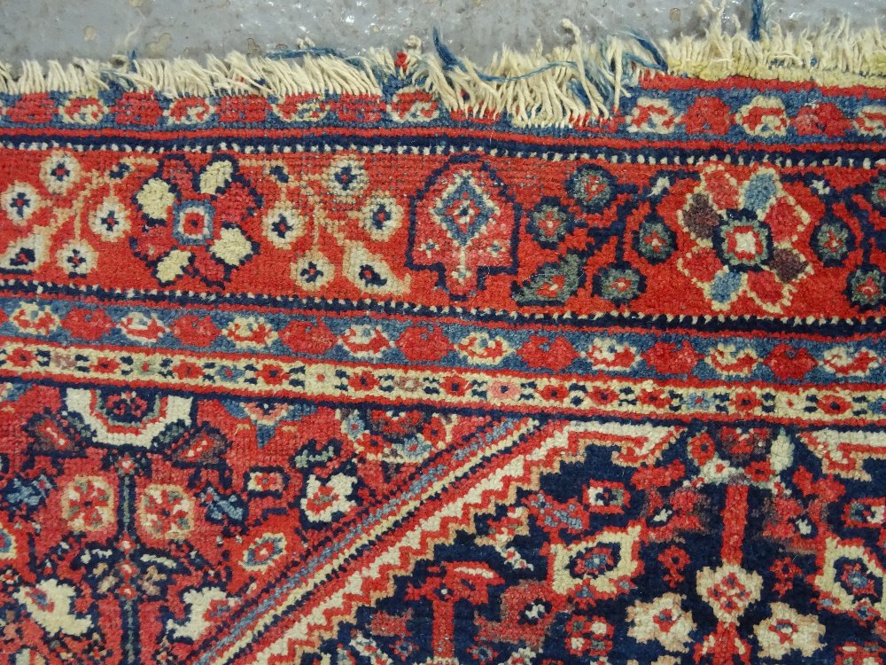 A Mahal rug, Persian, the dark indigo field with a madder central diamond, matching spandrels, - Image 4 of 6