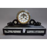 A Victorian black slate and marble inlaid mantel clock,