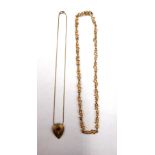 A 9ct gold, carbuncle garnet and diamond set pendant necklace, having a matt finish,