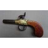 An English turn off barrel percusson pocket pistol, circa 1840, with mahogany handle,