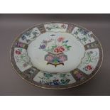 A large Chinese export famille-rose plate, early Qianlong,