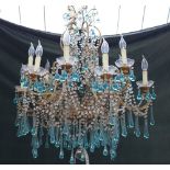 A Louis XV style gilt metal twelve branch chandelier, late 20th century,