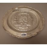 A South American silver shaped circular dish, probably Venezuelan, commemorating independence,