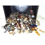 A large quantity of metal and other cased wristwatches.