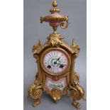 A late 19th century French gilt metal and porcelain mounted 8 day mantel clock (35cm high),