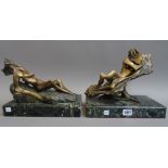 A pair of patinated bronze figures, late 20th century, of contemporary stylized form,