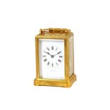 A French brass cased carriage clock, late 19th century, the white enamel dial detailed 'Drocourt',