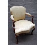 A mid-18th century mahogany framed open armchair, with serpentine seat and cabriole supports,