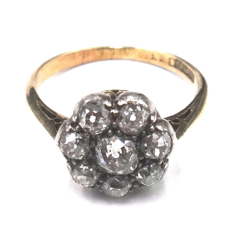A gold and diamond eight stone cluster ring,