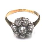 A gold and diamond eight stone cluster ring,