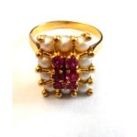 A gold, synthetic ruby and cultured pearl rectangular cluster ring,
