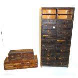A group of six small stained pine watchmaker's tool boxes, each with a variety of small drawers,