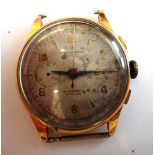 A gold, circular cased gentleman's chronograph wristwatch, with a jewelled Swiss movement,