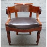 A late 19th century mahogany framed tub back office chair with studded brown leather upholstered