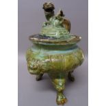 A Chinese faux-bronze green-glazed pottery tripod censer and cover, probably 19th century,