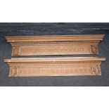 A pair of 18th century style carved lime wood over doors, late 19th century,