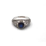 A synthetic sapphire and diamond ring,