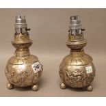A pair of plated Asian table lamps, each base of spherical form,