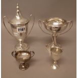Silver, comprising; a twin handled lidded trophy cup, presentation inscribed, Chester 1923,