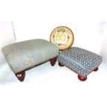 A group of three 20th century upholstered footstools with tapering supports,