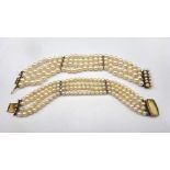 A four row bracelet of uniform cultured pearls, on a gold, sapphire and cultured pearl snap clasp,