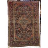 A Kashan rug, Persian, 208 x 133cm.