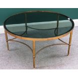 A mid-20th century lacquered brass circular coffee table,