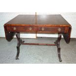 A 19th century mahogany two drawer sofa table on baluster silhouette supports,