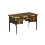 A Louis XVI style gilt metal mounted mahogany bureau plat/ writing desk, circa 1900,
