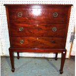 An Edwardian mahogany chest on stand with three drawers on tapering supports, 68cm wide x 85cm high.