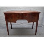 An early 19th century inlaid mahogany serpentine sideboard,
