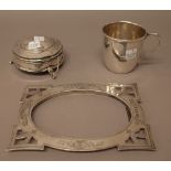 Silver and silver mounted wares, comprising; a shaped rectangular photograph frame,