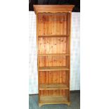 A 20th century tall pine bookcase 55cm wide x 224cm high.