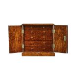 A Victorian figured walnut table top collector's chest,