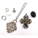 A pendant devotional icon, in a crucifix design, two Coptic Church pendant crosses, a neckchain,