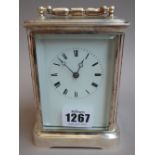 A French silver plated brass cased carriage clock, early 20th century, with white enamel dial,
