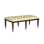 A large rectangular footstool,