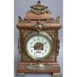 A Continental oak cased 8 day mantel clock, early 20th century,