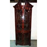 A George II style mahogany bowfront corner display cabinet, 19th century,